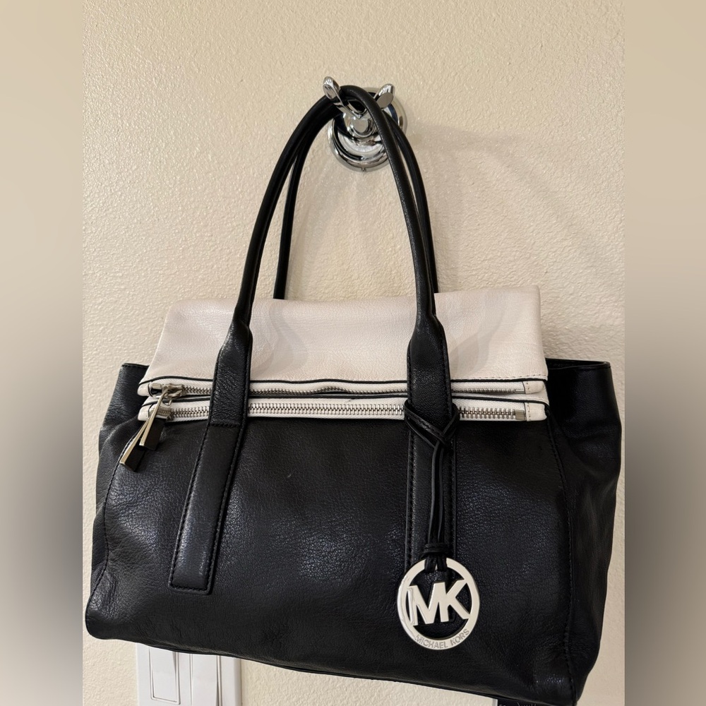 Michael Kors black and white hand bag.